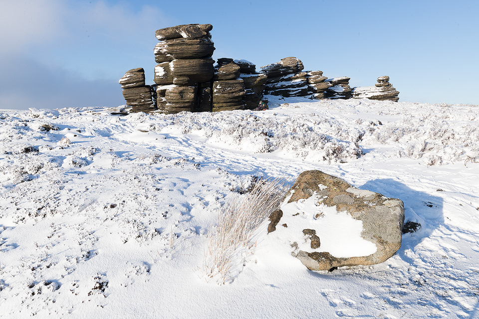 Some fantastic wintry conditions at the Wheel stones on Derwent Edge in the Peak District National Park. The Wheel Stones (otherwise known as the Coach and Horses) sit high up behind Derwent Edge overlooking the busy A57 Snake Pass. These strange gritstone formations have been shaped by the elements battering the Derwent Moors over many years. I've visited this location many times over the years, never quite getting the right conditions. On this occasion hoar frost, snow, low cloud and some sublime light combined for a spectacular Winter wonderland. 